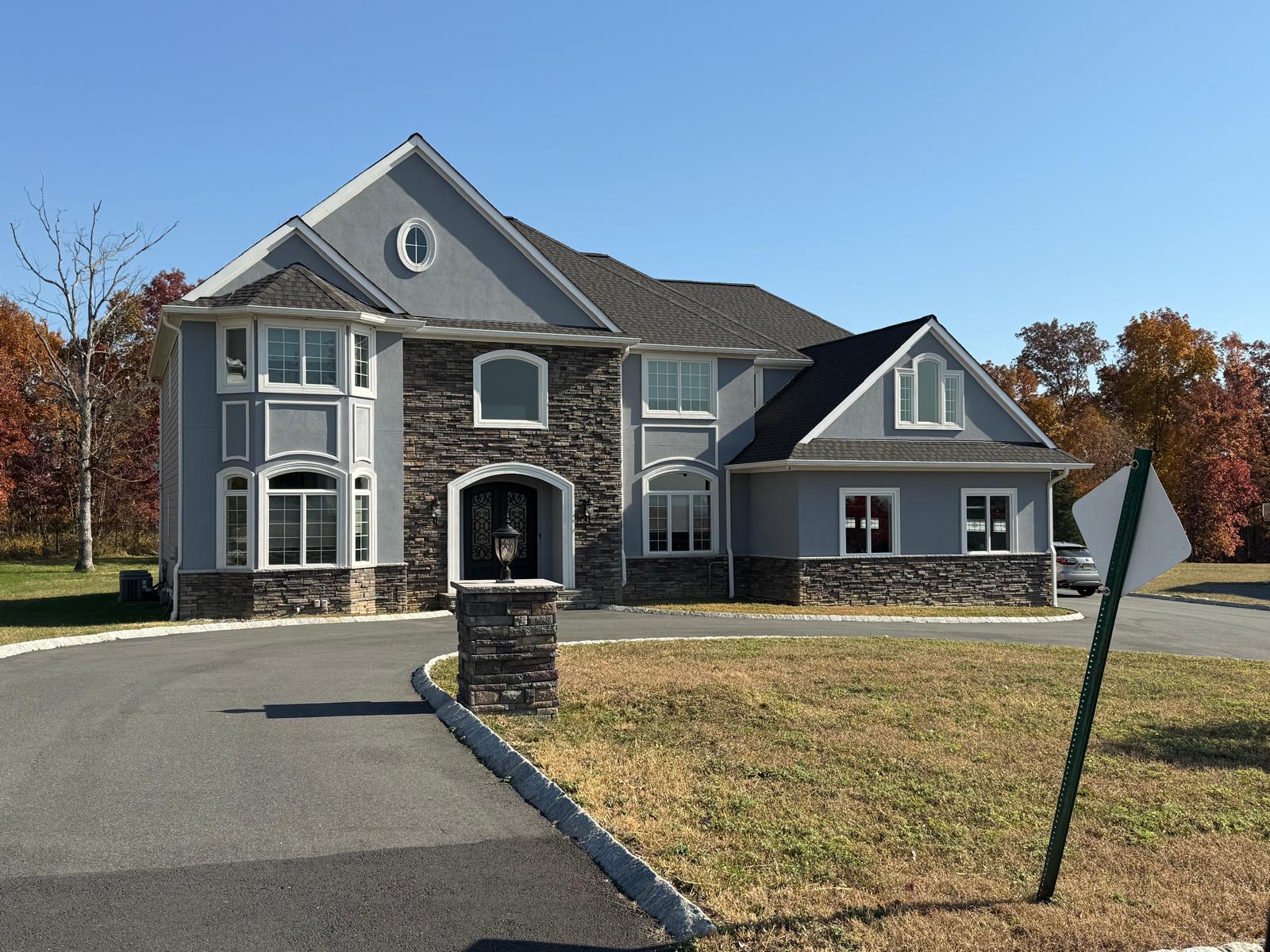 Stone siding and stucco siding